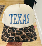 TEXAS Puff Embroidery in Dusty Blue on a natural and leopard hat